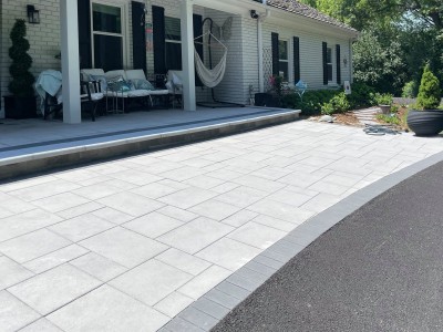 Beacon Hill Smooth Paver by Unilock and steps using Ledgestone coping 