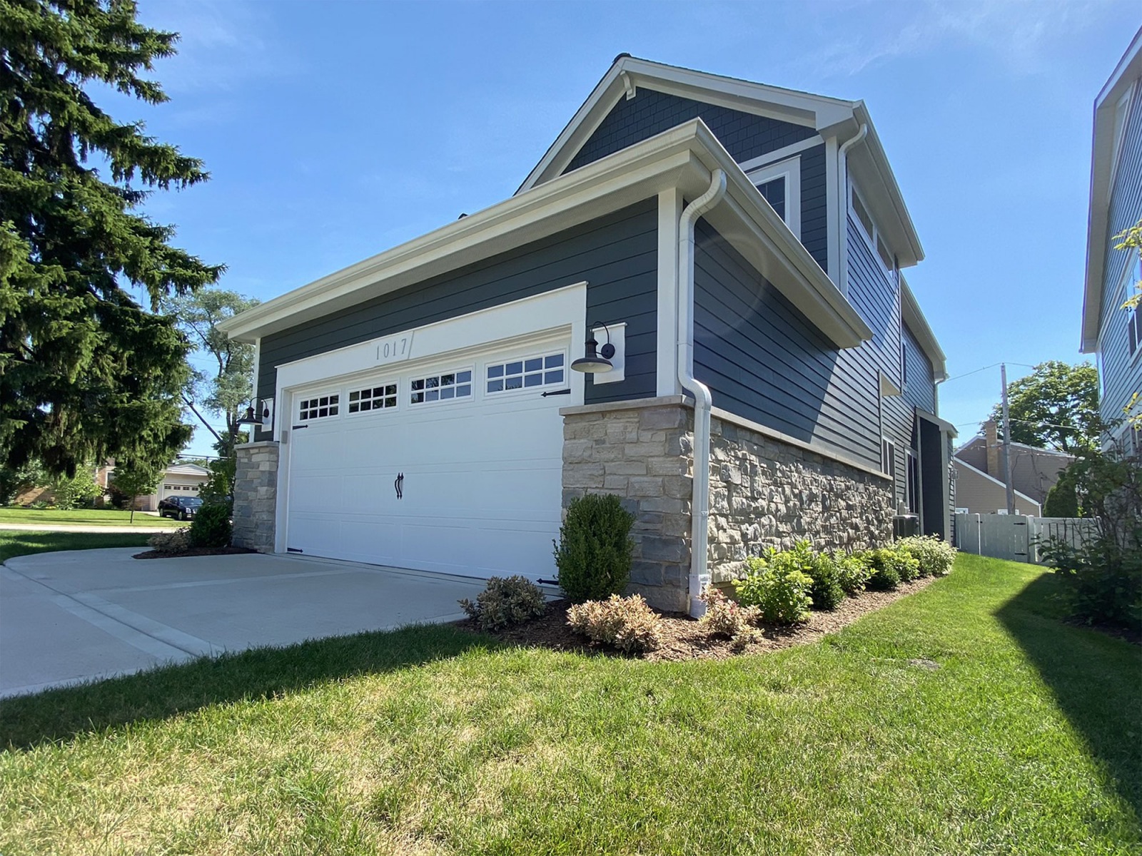 Side of house with new planting beds 