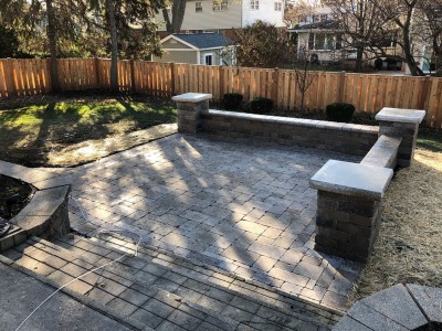 Brick paver patio seat wall and pillars using Brussels Block and Brussels Dimensional Stone by Unilock 